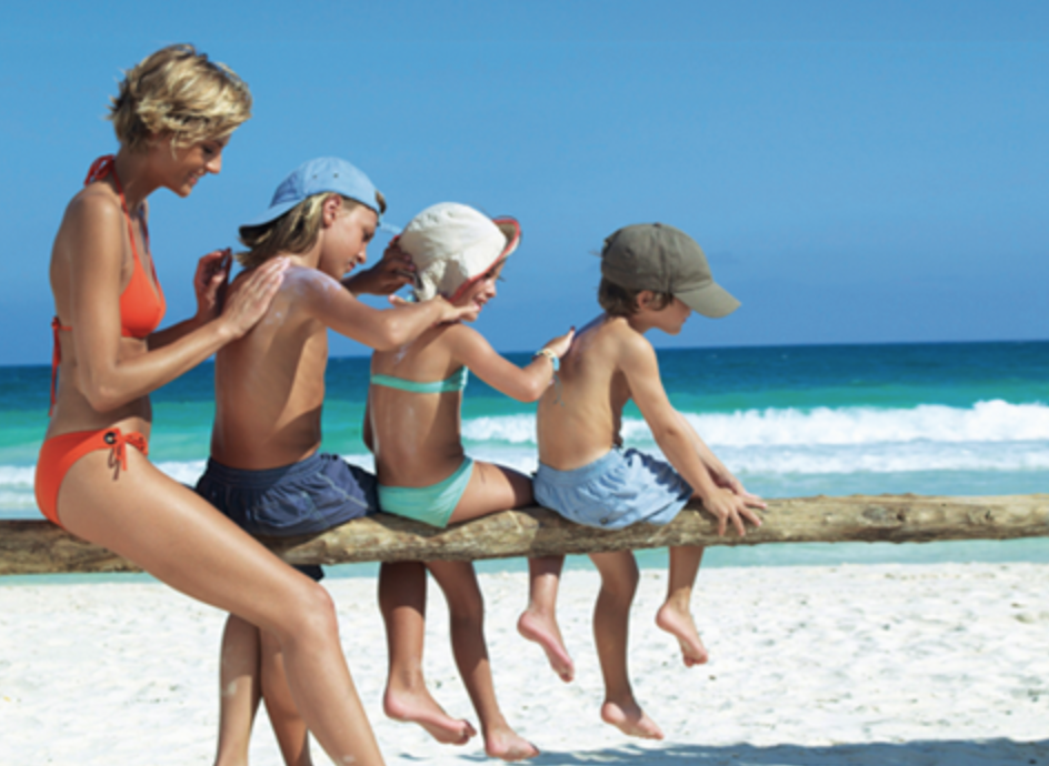 Sunscreen application on beach